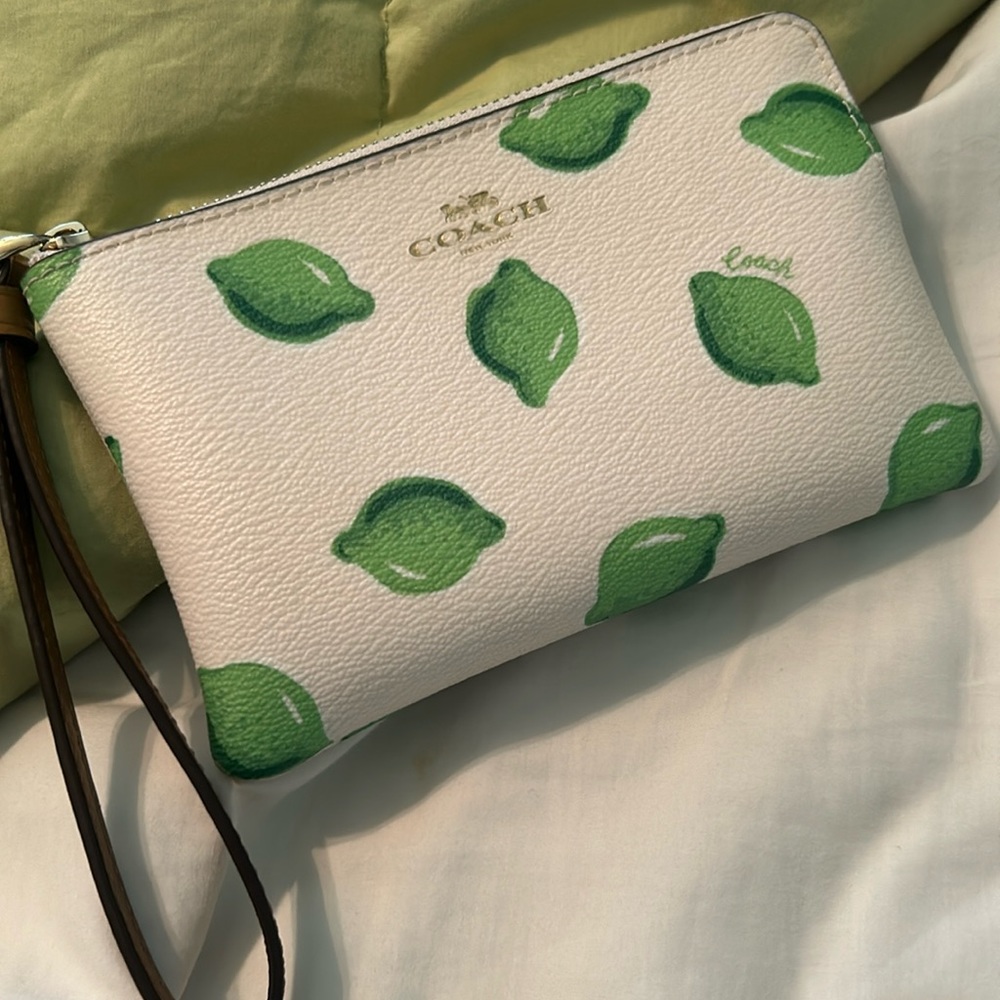 Coach wristlet with limes as print